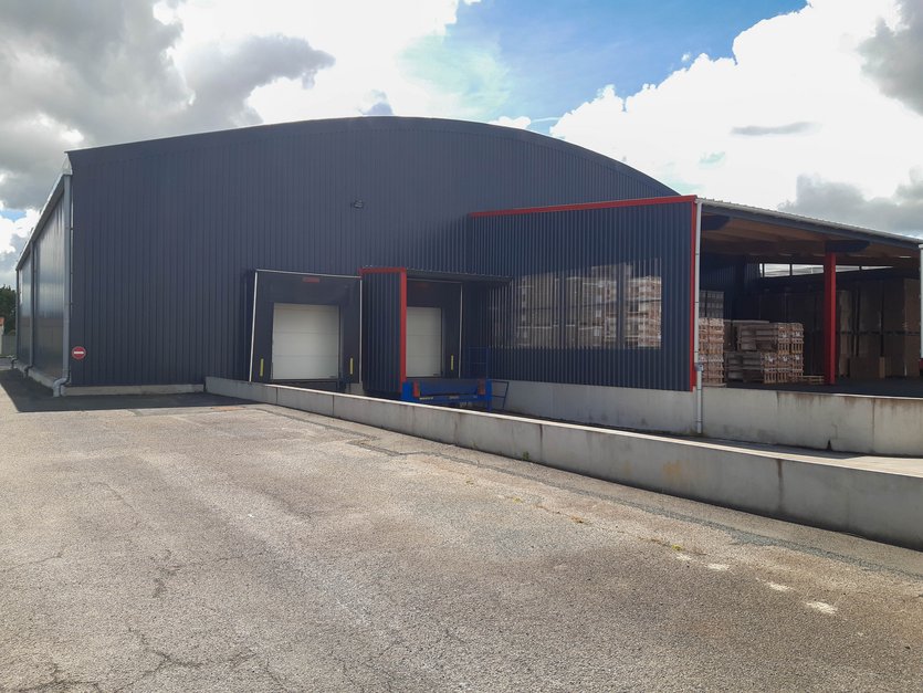Extension bâtiment de stockage avec quais de chargement