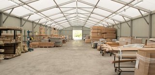 Une invention astucieuse pour produire plus vite des charpentes Une invention astucieuse pour produire plus vite des charpentes