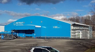 Bâtiment démontable pour la distribution